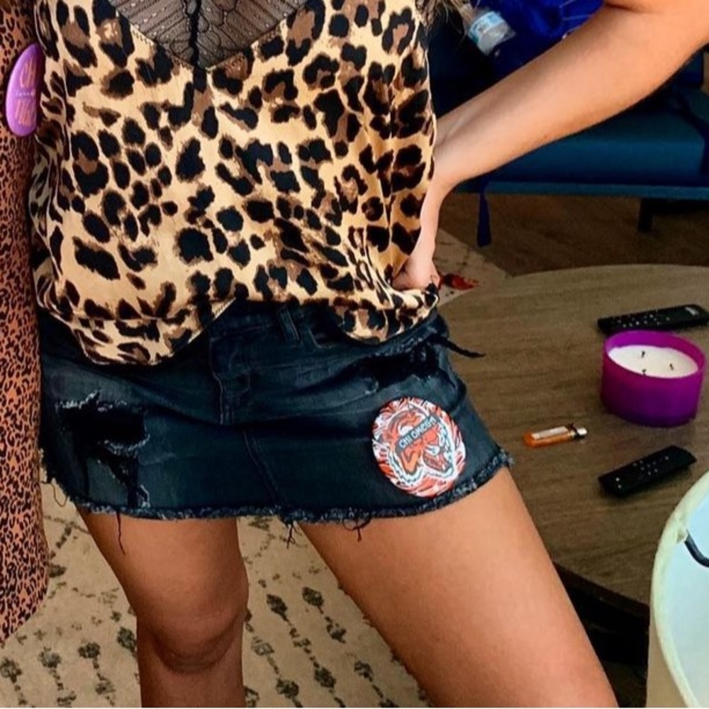 Black distressed denim skirt